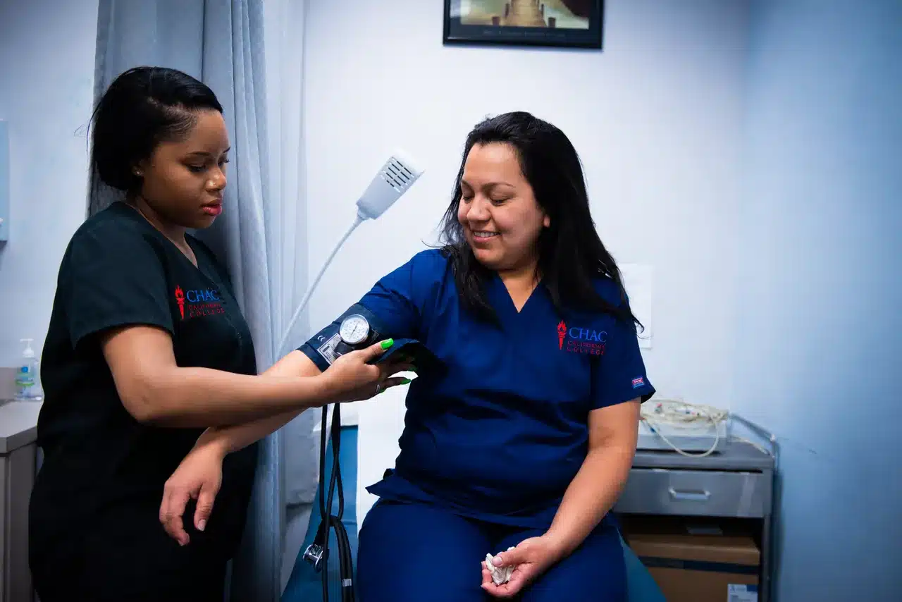 Students practicing vital signs